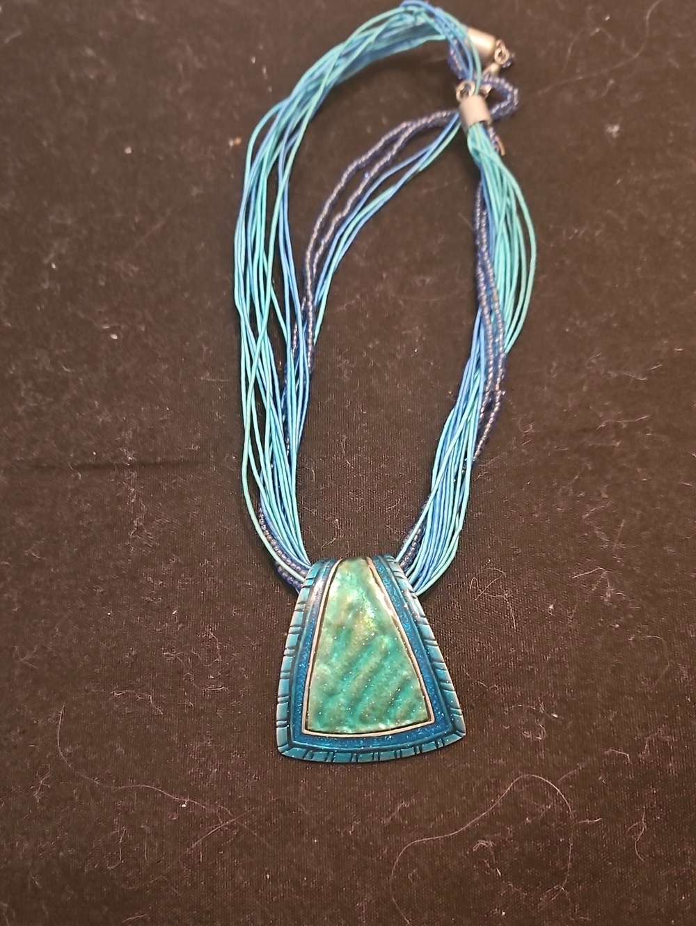Multi-Strand Blue Cord Necklace with Brushed Silver Pendant...19" LENGTH W/ 3" E